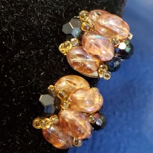 Vintage goldtone clip on earrings with mauve and plum beads